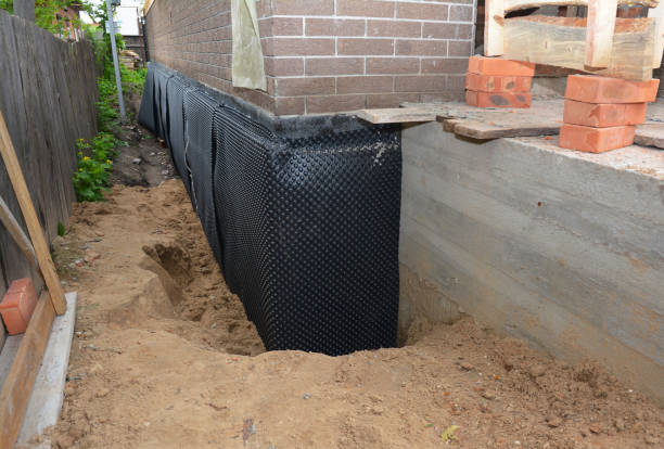 Happy homeowners after waterproofing job in Thorndale